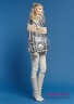Куртка женская NAUMI 18 W 808 01 73 Silver – Серебряный ​на пуховом утепленном подкладе. Прямого силуэта, среднего объема, длиной до середины бедра. Вид сбоку 2