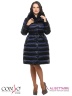 Эффектное женское пальто Conso WMF170543 - navy – темно-синий​ кроя oversize. Модель прямого силуэта длиной ниже колена застегивается на кнопки с декоративными обтяжными пуговицами. Фото 2
