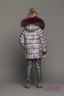 Зимняя куртка-пуховик с натуральным наполнителем, интересным дизайном, теплым капюшоном и шикарным мехом енота PRINCESS NAUMI PN17 271 02 COSMO 